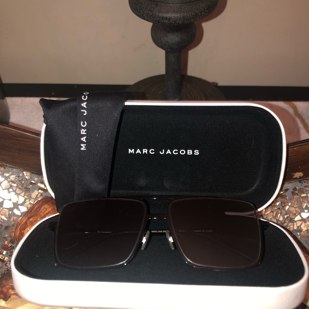 Marc Jacobs; nice black sunglasses; very pretty and delicate; very classy